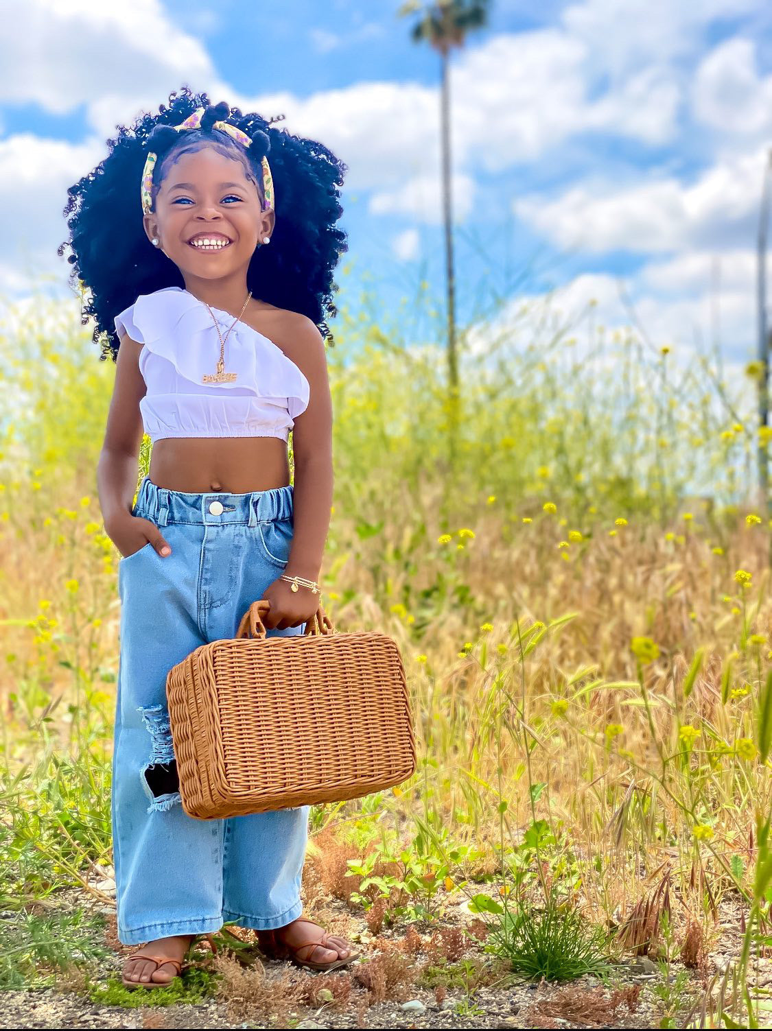 Little girl deals distressed jeans