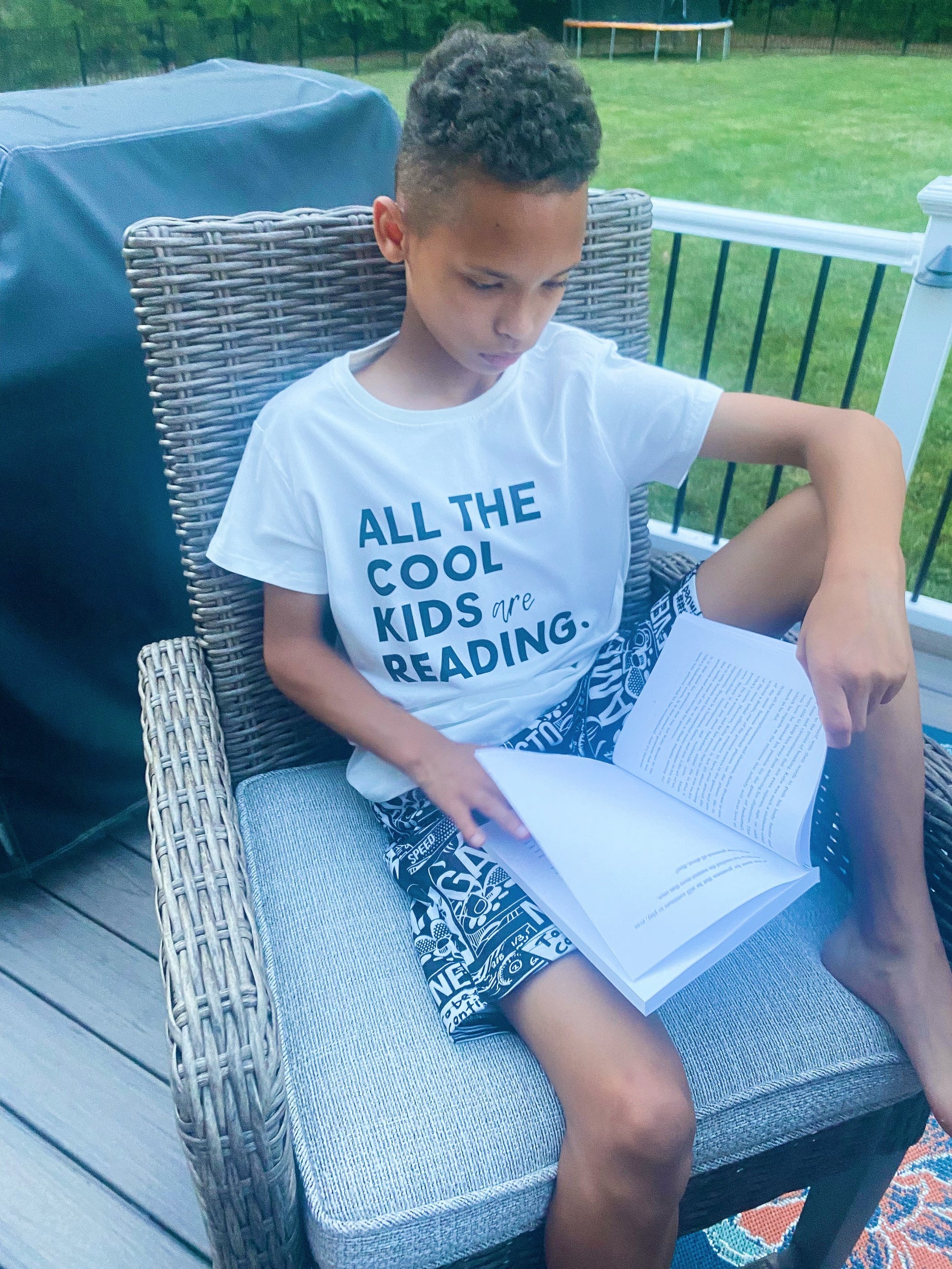 ALL THE COOL KIDS ARE READING Unisex Jersey Short Sleeve Tee By
